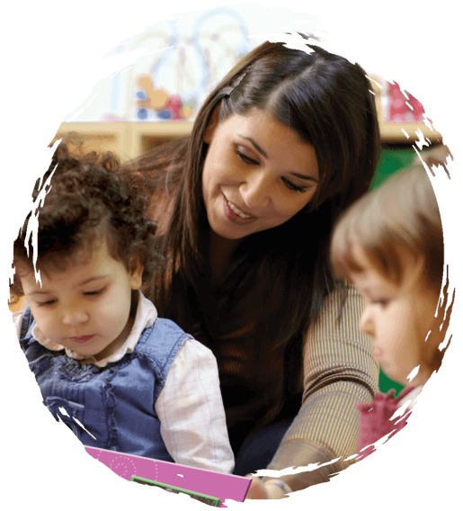 Teacher reading to toddlers